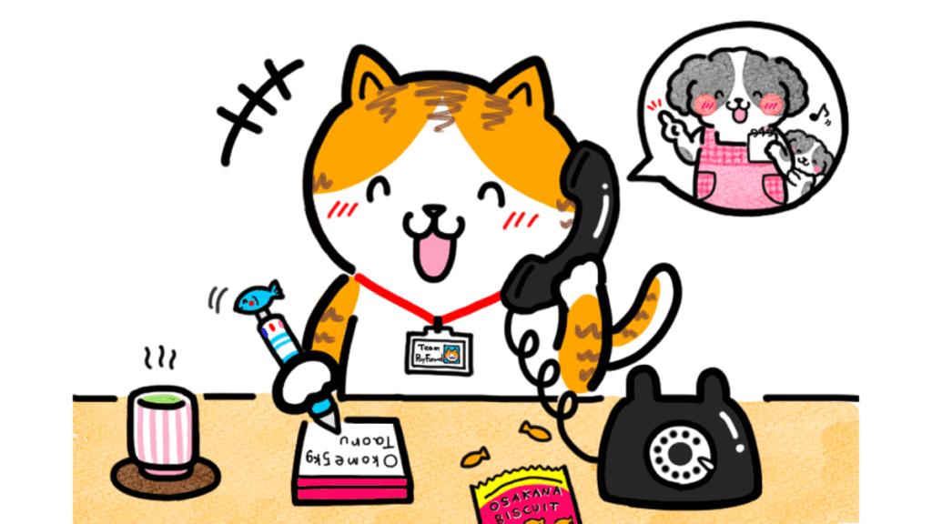 電話対応をしている猫のイラスト画像